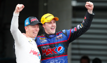 Mark Winterbottom celebrates his Bathurst victory alongside co-driver Steven Richards