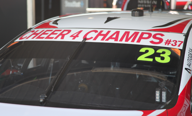 Michael Caruso's Nissan is carrying support for Adam Goodes at Ipswich