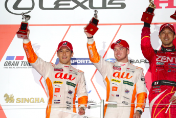 Nick Cassidy (centre) and Daisuke Ito celebrate a second place finish