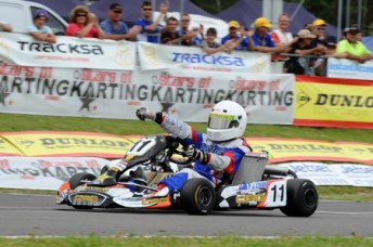 CIK_SOK1_17335_(photowagon.com.au)_med Pierce Lehane crossing the line for victory in the Pro Junior (KF3) category. Pic: photowagon.com.au