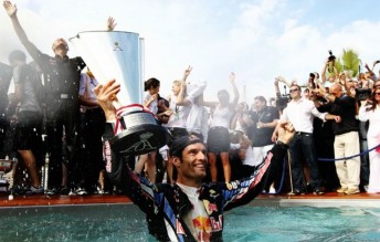 thumb Mark Webber celebrates in the pool at Monaco