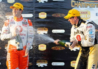 thumb Team Vodafone's Jamie Whincup cops a spray from Jim Beam Racing's James Courtney