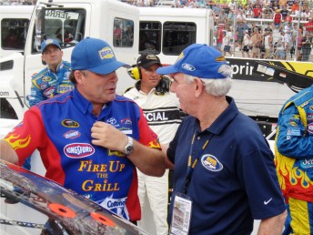 Marcos Ambrose's Crew Chief Frank Kerr speaks with Jimmy Stone
