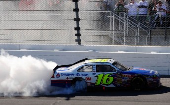 thumb Greg Biffle celebrates his Kansas win