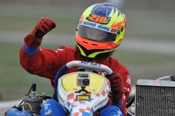 thumb Jake Dennis crossing the line to become the first champion in the new World Under 18 Karting Championship. Pic: KSP