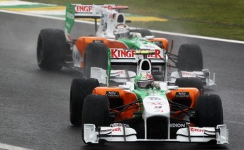 Picture 13 Tonio Liuzzi leads Adrian Sutil in Brazil, but finished four places behind his team-mate in the 2010 championship
