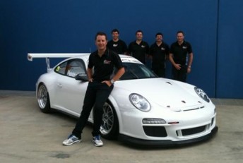 thumb Patrizi poses with his new car