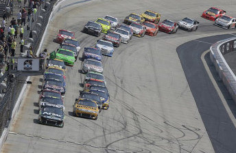 thumb Marcos Ambrose (front right) at the front of the pack