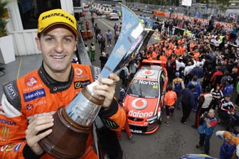 thumb Jamie Whincup with his championship trophy