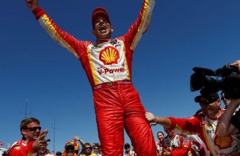 thumb Helio Catroneves celebrates his first IndyCar win since October 2010