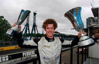 car Adrian Cottrell celebrates his Aussie Racing Cars Series win in Sydney last year