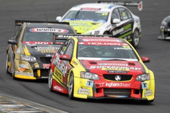 thumb McLaughlin leads Booth and McIntyre