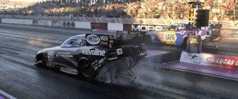 thumb Ron Capps (far lane) chased down Jack Beckman in the Funny Car final - the pair are just four points apart in the Championship