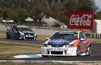 thumb Patrizi leads Blanchard through Turn 4