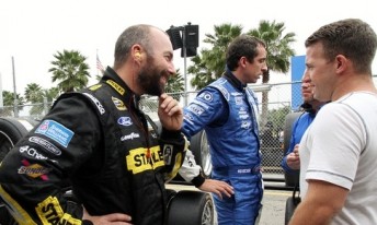 Marcos Ambrose speaking with AJ Allmendinger