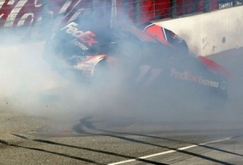 Denny Hamlin slams into the wall at Fontana