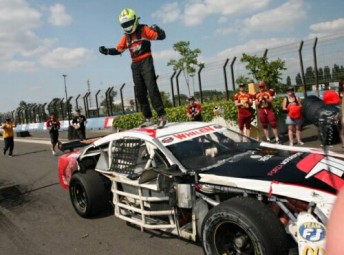 Josh Burdon celebrates with what's left of his Euro NASCAR!