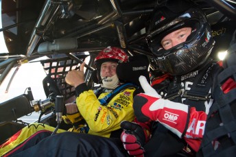 Jason Crump goes for a ride with good mate Paul Morris