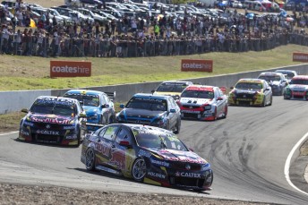 Craig Lowndes leading Jamie Whincup after the start of the final Symmons Plains heat