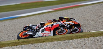 Dani Pedrosa and Aleix Espargaro (inside)