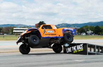 The trucks compete with temporary ramps to spice up the action