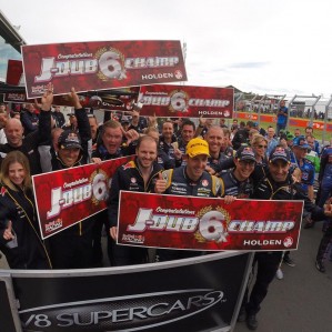 Jamie Whincup celebrates a sixth title