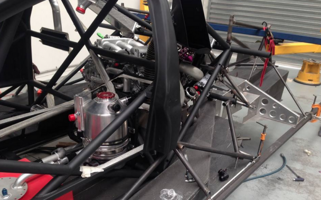 The engine sitting behind the standard Focus B-pillar