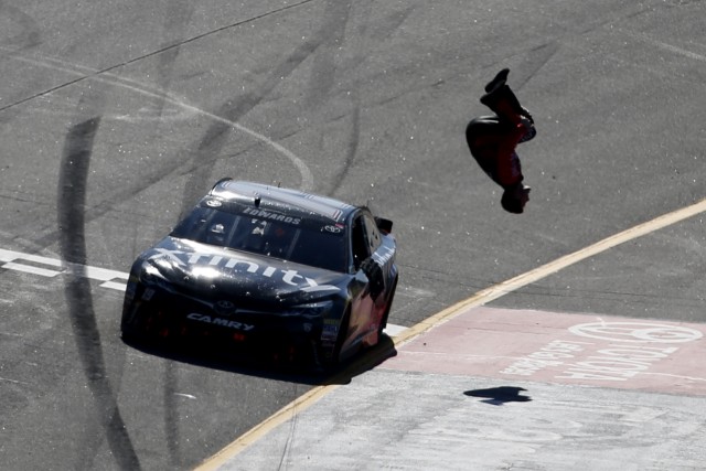 Carl Edwards completes a now customary NASCAR winning celebration at Richmond