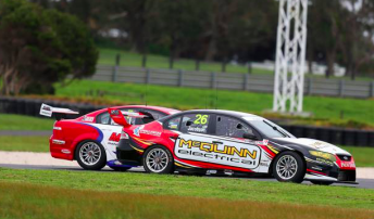 Garry Jacobson take the lead in the Kumho V8 Touring Car Series