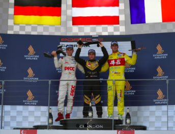 Martin Ragginger (centre) took the win in Singapore
